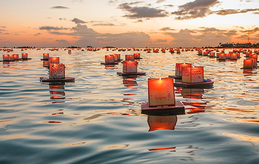floating lanterns down a river