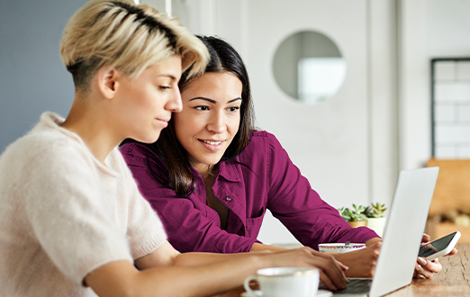Couple reviewing their finances online
